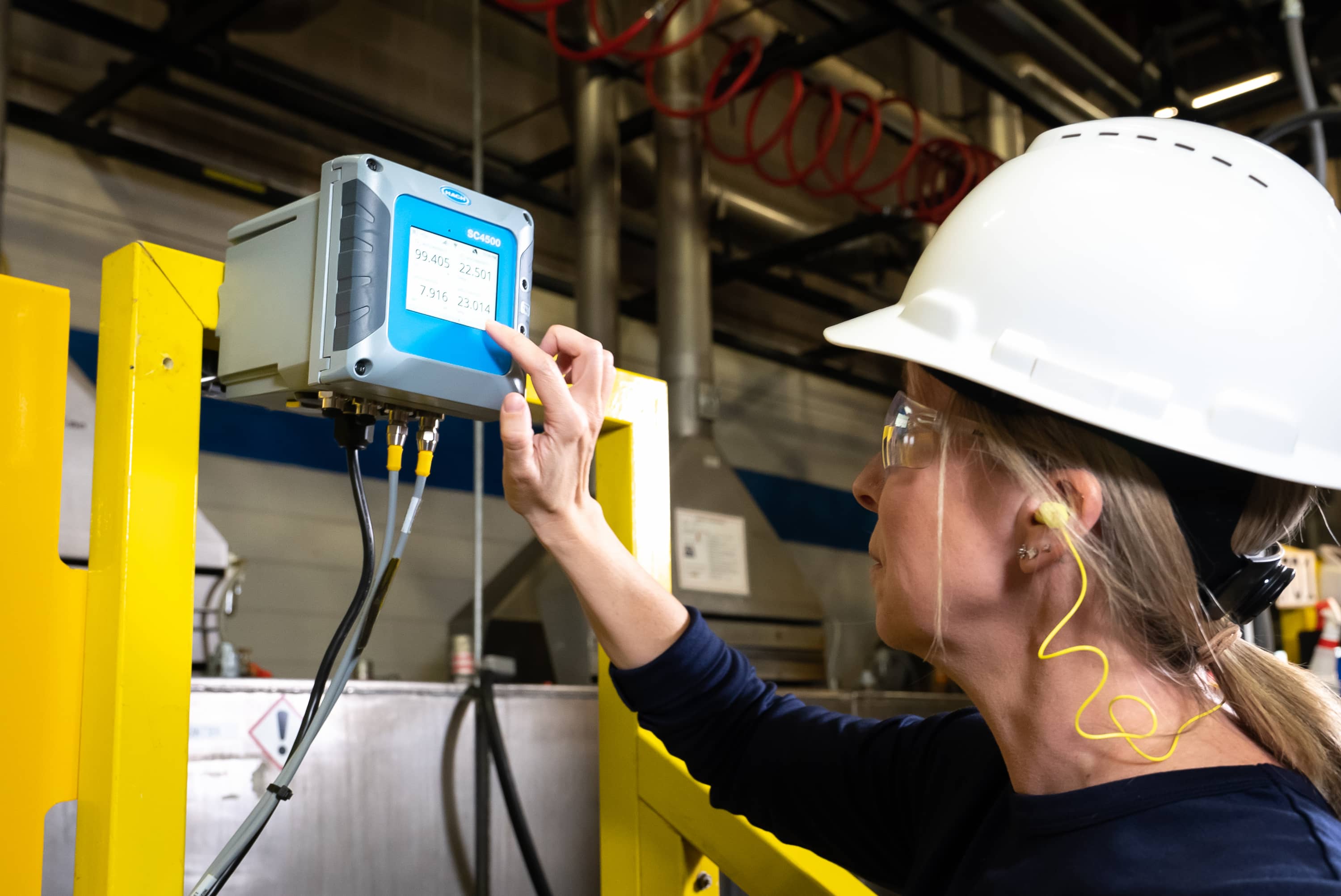 Hach SC4500 controller mounted in plant with operator